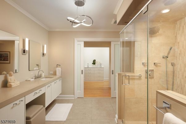 Bathroom, Dual Sink Vanities, Glass Shower, Interior, Pendant Lights, Recessed Lighting, Wood Texture Flooring
