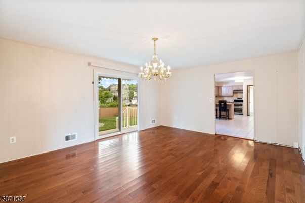 Chandelier, Empty room, Interior, Kitchen, Stainless Steel Appliances, Wood Texture Flooring