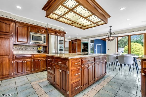 Dining room, Interior, Kitchen, Pendant Lights, Recessed Lighting, Stainless Steel Appliances, Tile Countertops