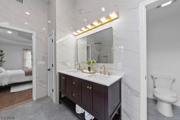 Bathroom, Bedroom, Dual Sink Vanities, Interior, Marble Walls, Recessed Lighting