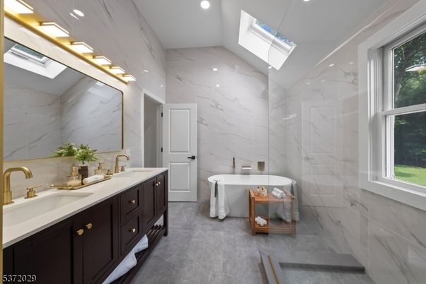 Bathroom, Dual Sink Vanities, Free Standing Baths, Interior, Marble Walls, Recessed Lighting