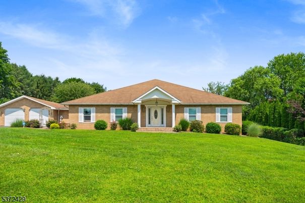 Attached, Backyard, Exterior, Facade, Brick Facade, Ranch