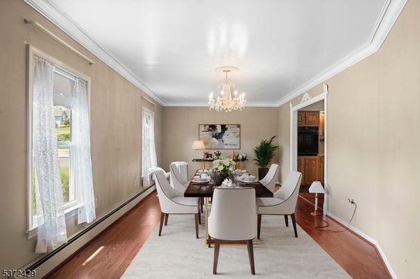 Chandelier, Dining room, Interior, Wood Texture Flooring