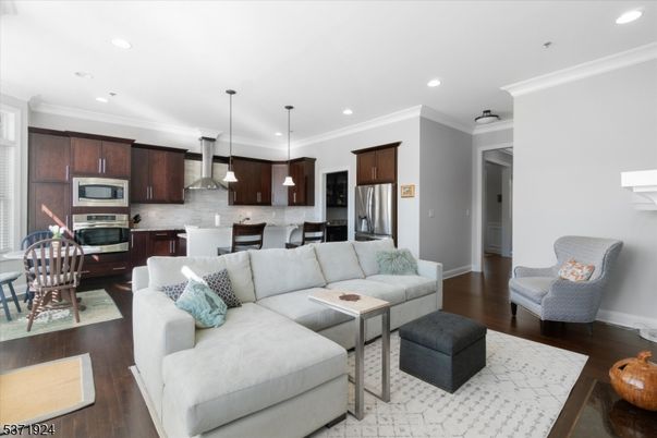 Dining room, Interior, Kitchen, Living room, Pendant Lights, Recessed Lighting, Stainless Steel Appliances, Wood Texture Flooring