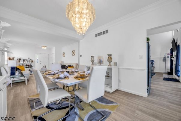 Chandelier, Dining room, Interior, Wood Texture Flooring