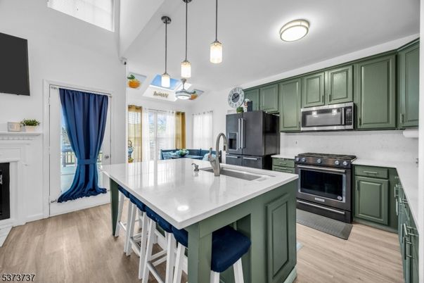 Interior, Kitchen, Pendant Lights, Stainless Steel Appliances, Wood Texture Flooring