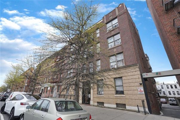 Exterior, Facade, Brick Facade, Condo Building