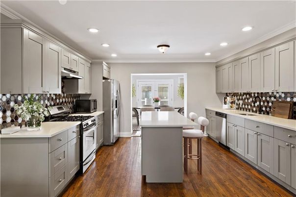 Dining room, Interior, Kitchen, Recessed Lighting, Stainless Steel Appliances, Wood Texture Flooring