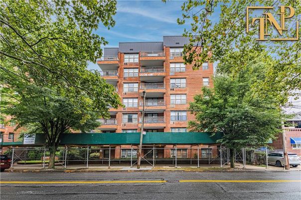 Exterior, Facade, Brick Facade, Condo Building