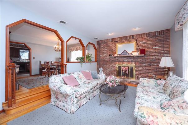 Chandelier, Dining room, Fireplace, Interior, Living room, Recessed Lighting, Stone Walls, Wood Texture Flooring
