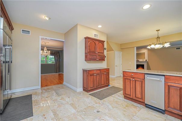 Chandelier, Fireplace, Interior, Kitchen, Recessed Lighting, Wood Texture Flooring