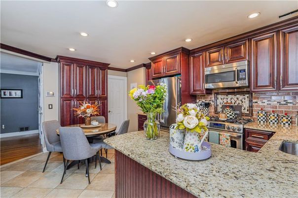Dining room, Interior, Kitchen, Recessed Lighting, Stainless Steel Appliances, Wood Texture Flooring