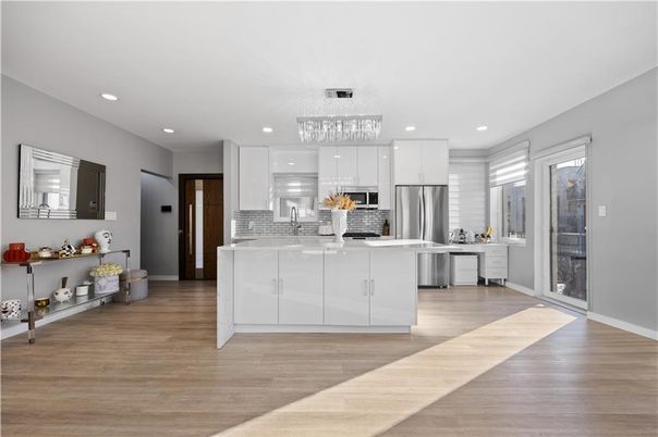 Chandelier, Interior, Kitchen, Recessed Lighting, Stainless Steel Appliances, Wood Texture Flooring