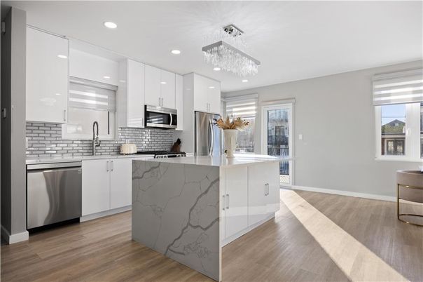 Chandelier, Interior, Kitchen, Recessed Lighting, Stainless Steel Appliances, Wood Texture Flooring