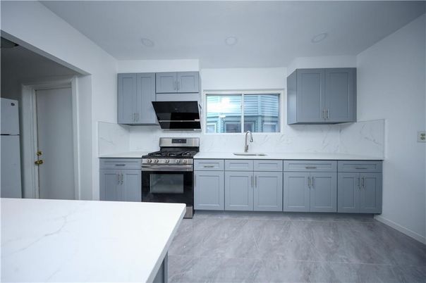 Interior, Kitchen, Marble, Marble Walls, Recessed Lighting, Stainless Steel Appliances