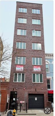 Attached, Exterior, Facade, Brick Facade, Condo Building