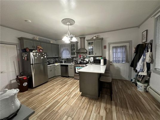 Chandelier, Interior, Kitchen, Pendant Lights, Stainless Steel Appliances, Wood Texture Flooring