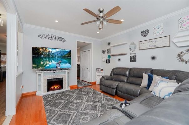 Fireplace, Interior, Living room, Recessed Lighting, Wood Texture Flooring