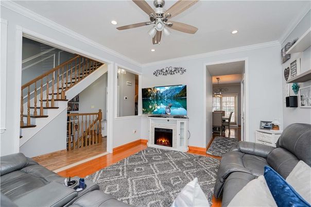 Fireplace, Interior, Living room, Recessed Lighting, Wood Texture Flooring