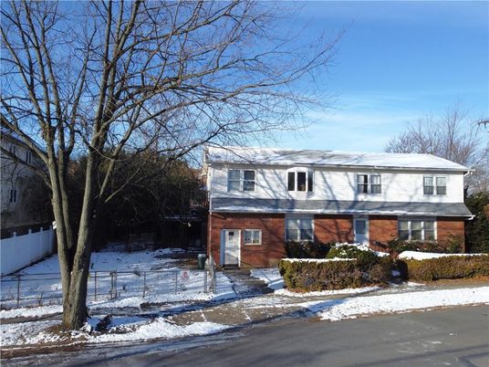 Exterior, Facade, Brick Facade, Raised Ranch