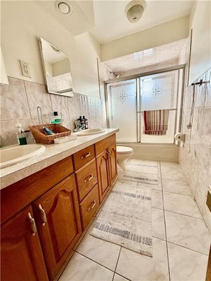 Bathroom, Dual Sink Vanities, Glass Shower, Interior, Marble, Recessed Lighting