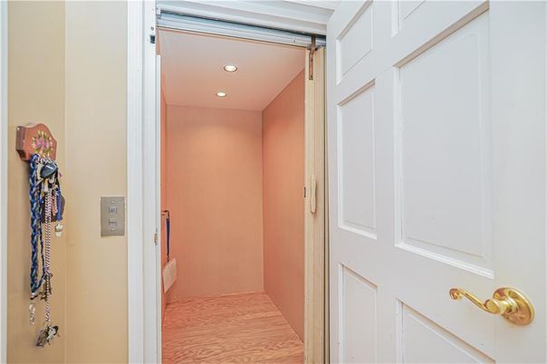 Elevator, Interior, Recessed Lighting, Wood Texture Flooring