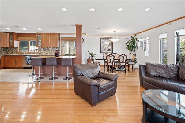 Dining room, Interior, Kitchen, Pendant Lights, Recessed Lighting, Stainless Steel Appliances, Wood Texture Flooring