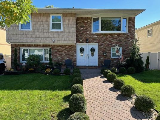 Exterior, Facade, Brick Facade, Raised Ranch