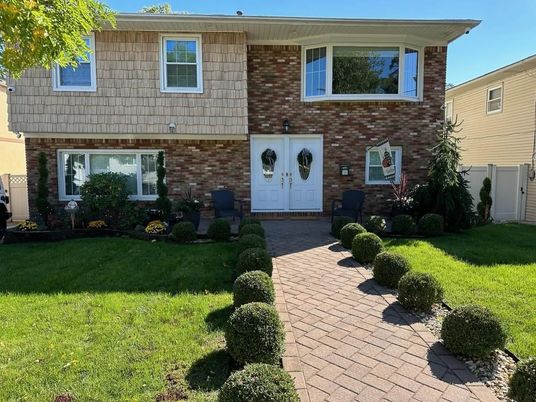 Exterior, Facade, Brick Facade, Raised Ranch