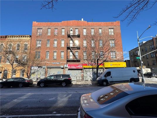Exterior, Facade, Brick Facade, Condo Building