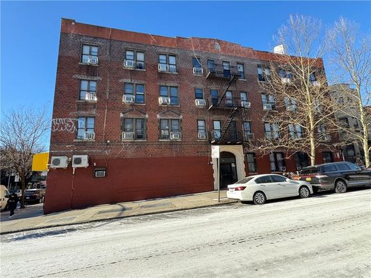 Exterior, Facade, Brick Facade, Condo Building