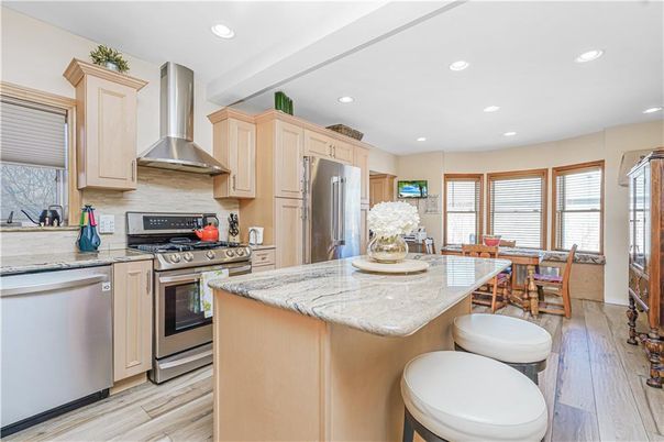 Dining room, Interior, Kitchen, Recessed Lighting, Stainless Steel Appliances, Wood Texture Flooring