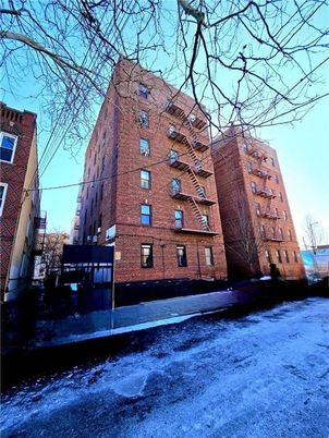 Exterior, Facade, Brick Facade, Condo Building