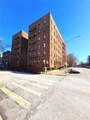 Exterior, Facade, Brick Facade, Condo Building
