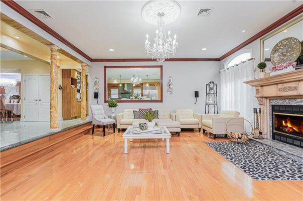 Chandelier, Dining room, Fireplace, Interior, Living room, Recessed Lighting, Wood Texture Flooring
