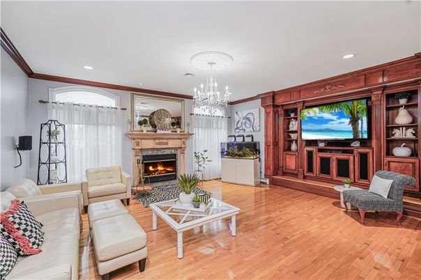 Chandelier, Fireplace, Interior, Living room, Recessed Lighting, Wood Texture Flooring