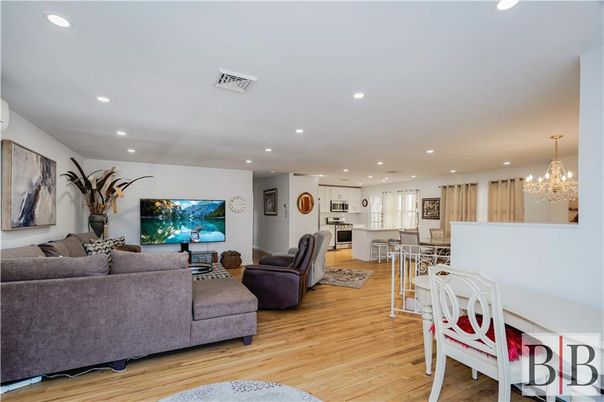 Chandelier, Dining room, Interior, Kitchen, Living room, Recessed Lighting, Stainless Steel Appliances, Wood Texture Flooring
