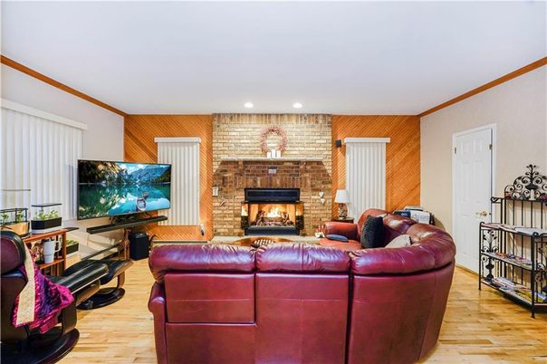 Fireplace, Interior, Living room, Recessed Lighting, Stone Walls, Wood Texture Flooring, Wooden Walls