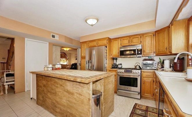 Interior, Kitchen, Stainless Steel Appliances, Tile Countertops
