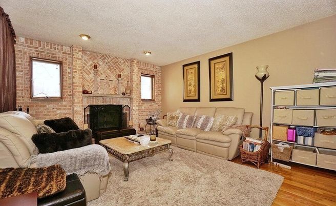 Fireplace, Interior, Living room, Recessed Lighting, Stone Walls, Wood Texture Flooring