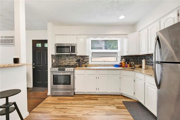Interior, Kitchen, Recessed Lighting, Stainless Steel Appliances, Wood Texture Flooring