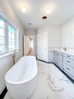 Bathroom, Dual Sink Vanities, Free Standing Baths, Interior, Marble, Marble Walls