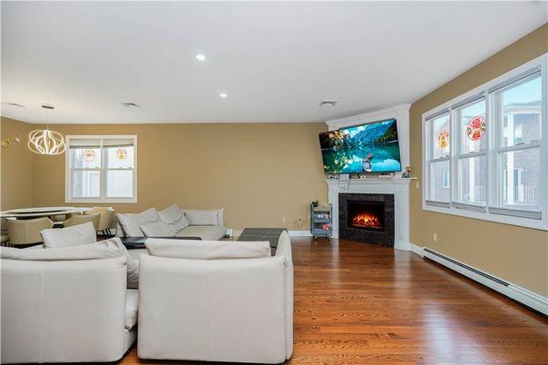 Billiard Table, Fireplace, Game Room, Interior, Living room, Pendant Lights, Recessed Lighting, Wood Texture Flooring