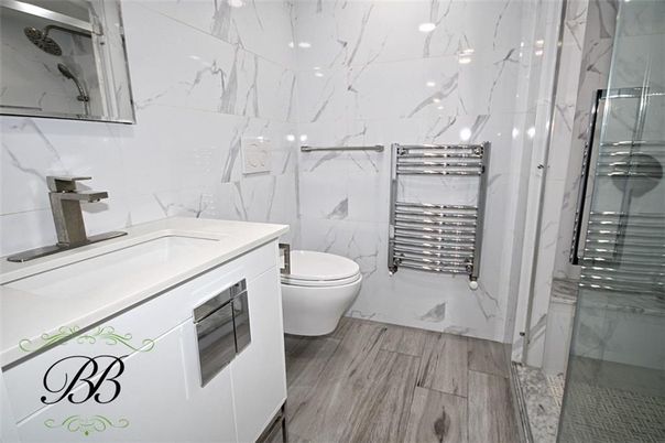 Bathroom, Glass Shower, Interior, Marble Walls, Wood Texture Flooring