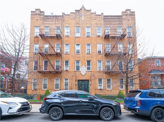 Exterior, Facade, Brick Facade, Condo Building