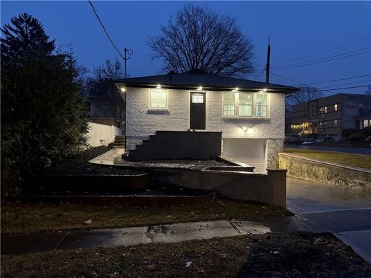 Exterior, Facade, Brick Facade, Raised Ranch