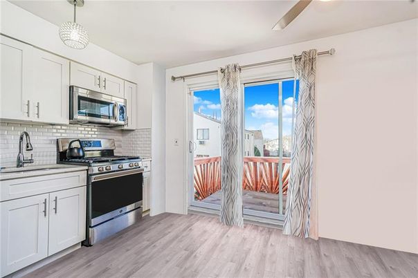 Interior, Kitchen, Pendant Lights, Stainless Steel Appliances, Wood Texture Flooring