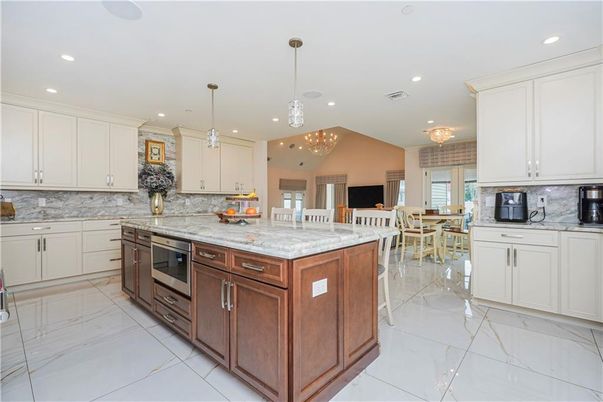 Chandelier, Dining room, Interior, Kitchen, Marble, Pendant Lights, Recessed Lighting, Stainless Steel Appliances