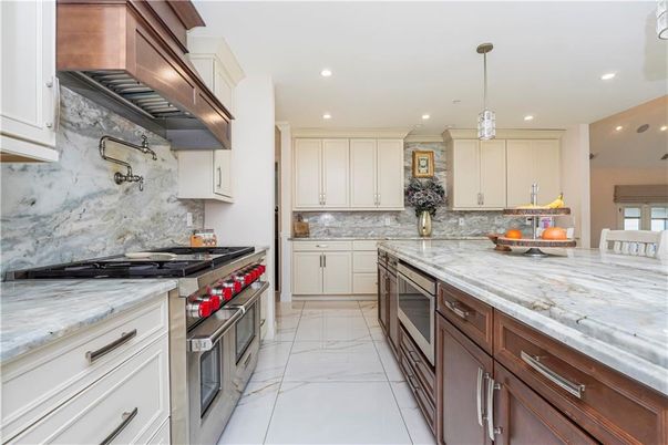 Interior, Kitchen, Marble, Marble Walls, Pendant Lights, Recessed Lighting, Stainless Steel Appliances