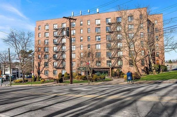 Exterior, Facade, Brick Facade, Condo Building